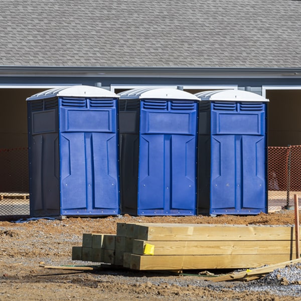 what is the cost difference between standard and deluxe portable toilet rentals in Blue River OR